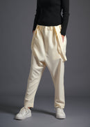 Tapered trousers with detachable shoulder straps, srouel silhouette, milk, cogthebigsmoke, one size fits all, sustainable fashion, less is more, made in Japan, quiet luxury, minimalist